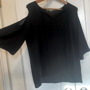 Flowy black blouse w/ cold shoulders, bell sleeves, and tie front